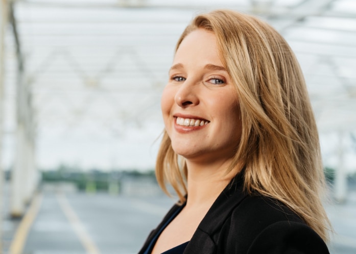Enterprise Mobility Team Member Smiling at Camera