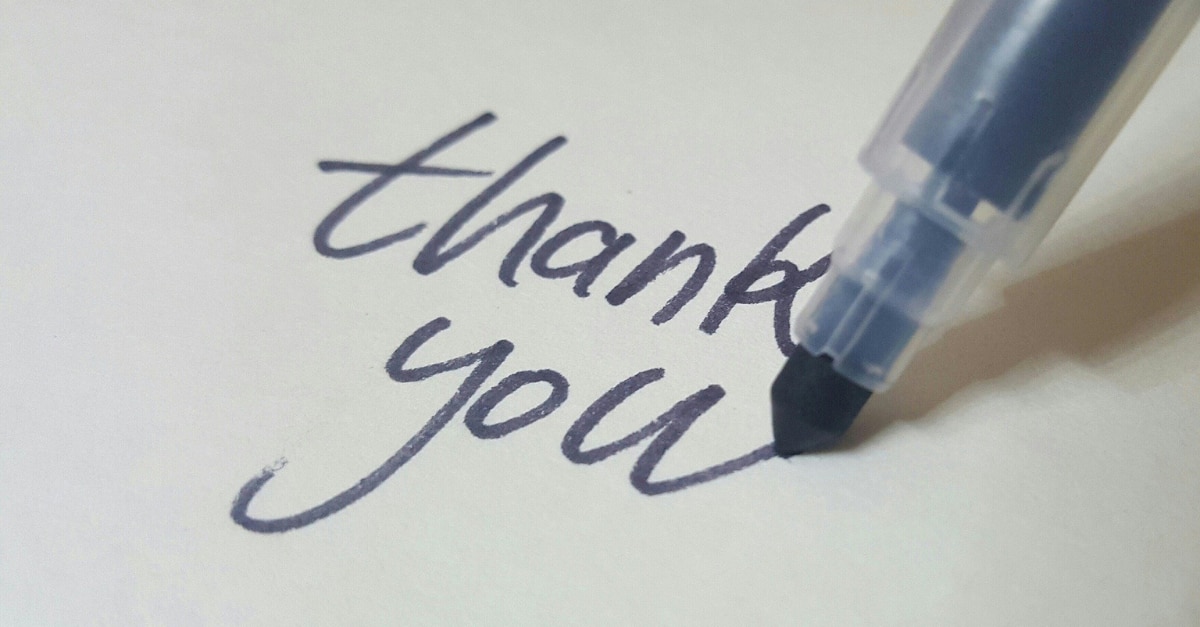 Pen writing "thank you"