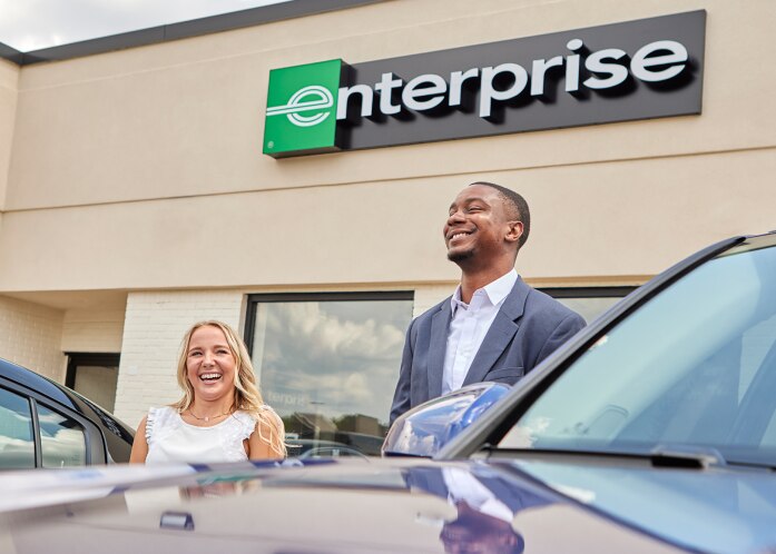 Two Enterprise Mobility employees laughing 