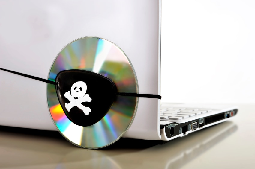 CD strapped to a laptop with a pirate eyepatch