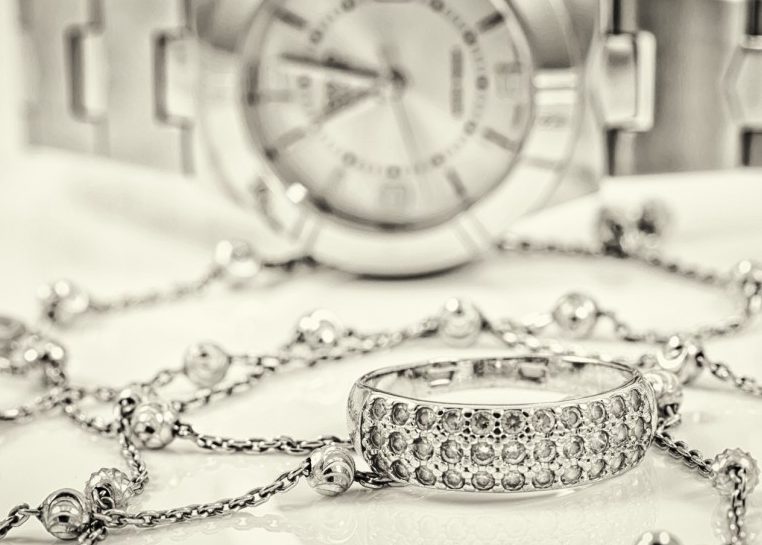 Silver ring, necklace, and watch