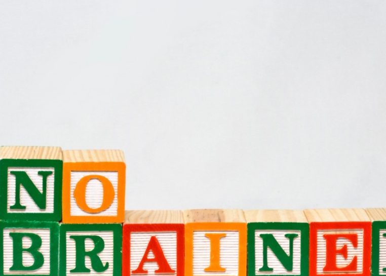 Children's alphabet blocks spelling "no brainer"