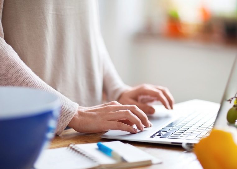 Laptop on kitchen counter