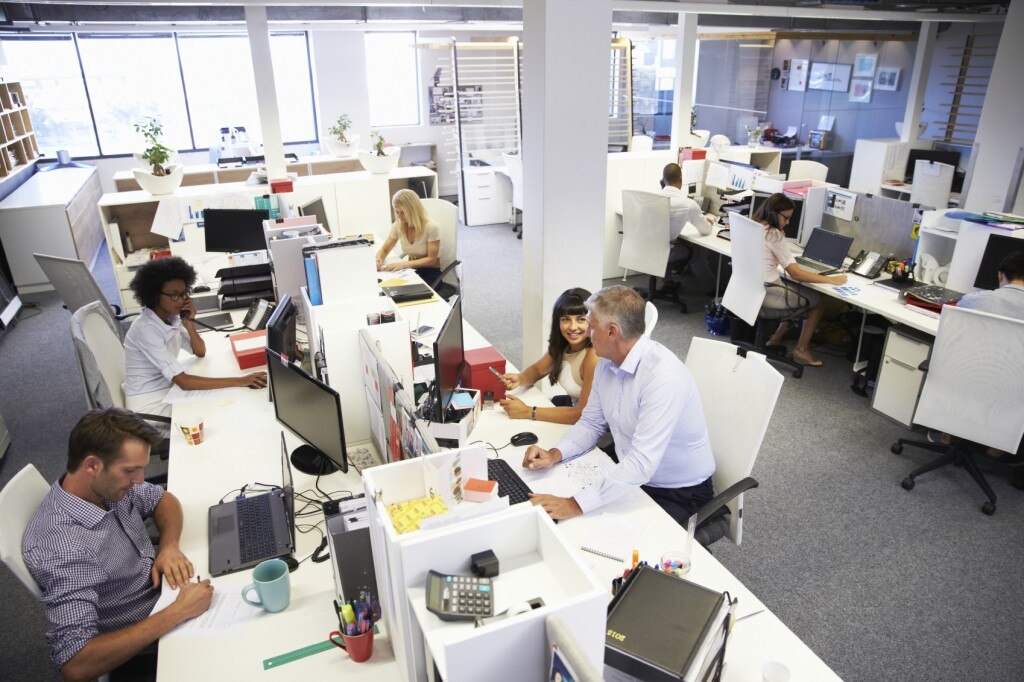 Office with people working and talking