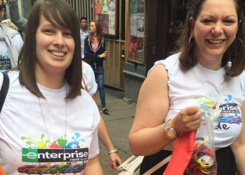Alice and another female wearing Enterprise shirts at a PRIDE event