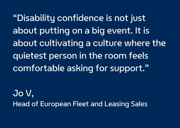 Jo with her son in a bike helmet with a quote