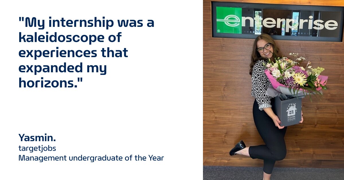 Yasmin picture with flowers in front of Enterprise sign with quote