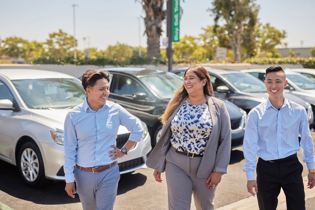 Enterprise Mobility employee poses for a picture at a community service activity.